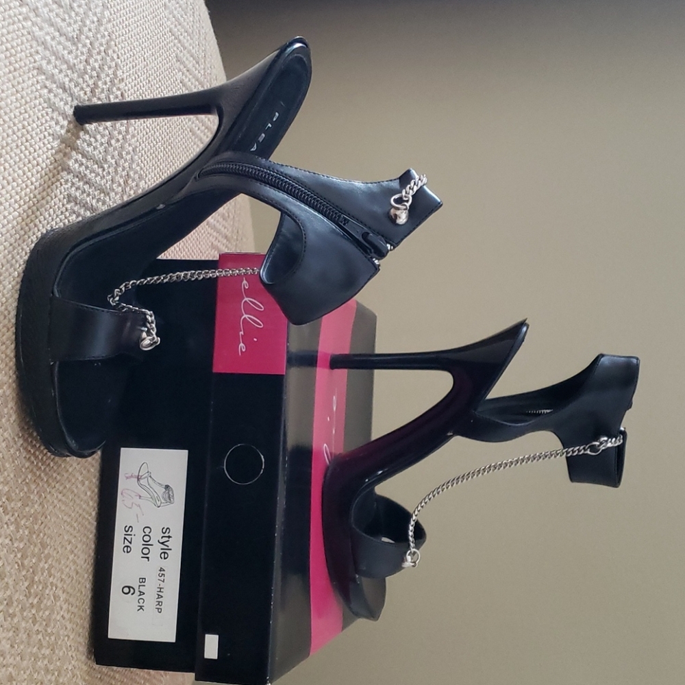 Black 4" heel, ankle wrap dress sandal.